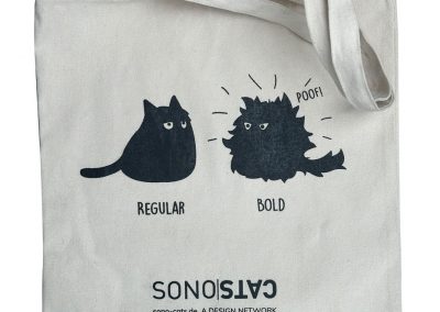 Vorschaubild einer Stofftasche mit Cartoon-Katzenillustration und Humor.